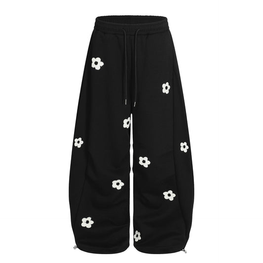 Flower embroidery curved knife sweatpants for men and women