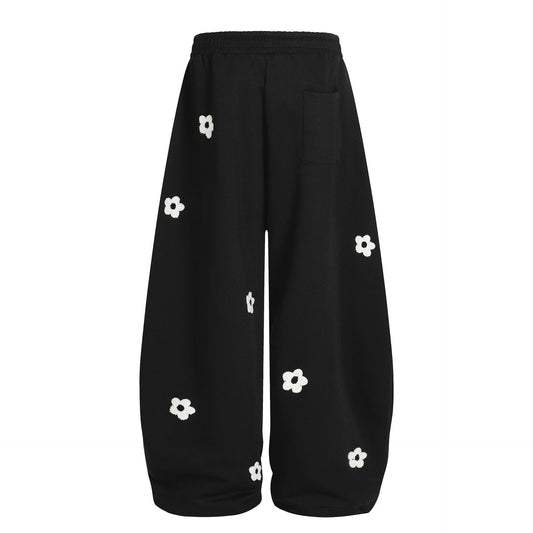 Flower embroidery curved knife sweatpants for men and women